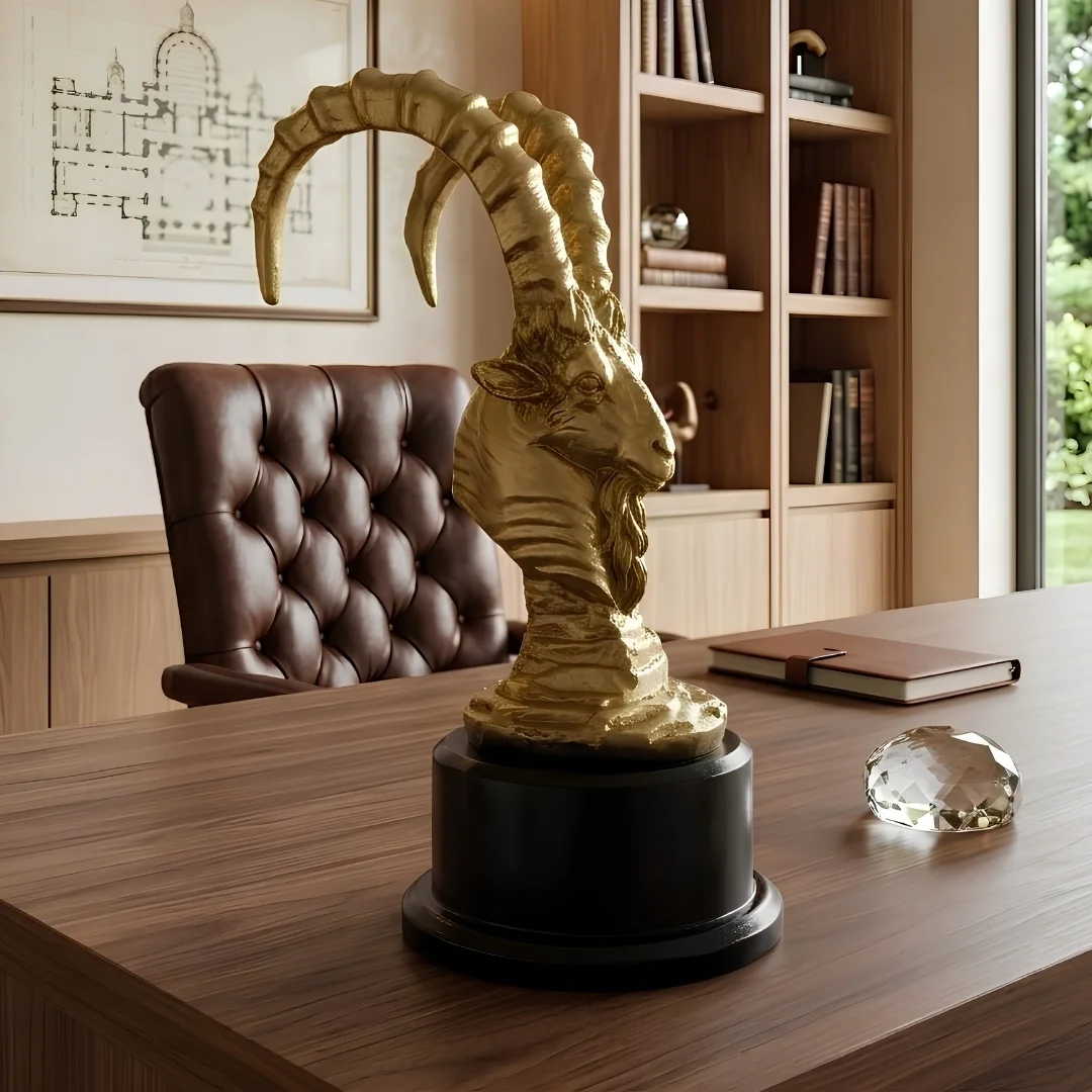 curved-horn-ibex-home-decor-2.webp Ibex Head Statue in Golden Finish - Image 1